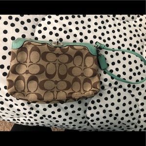 Coach Wristlet light turquoise on top!